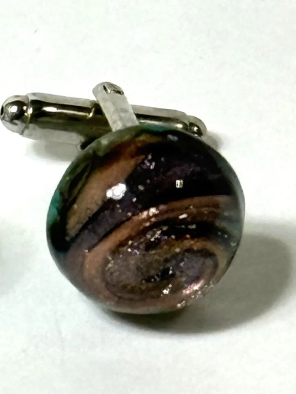 Dichroic glass men's cuff links.